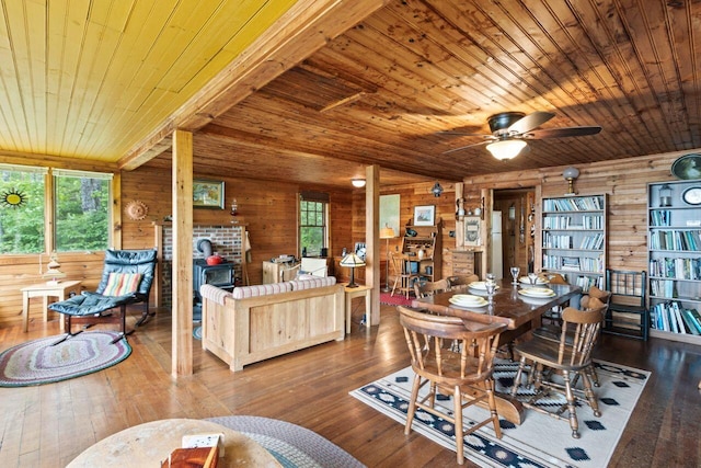 66 Myron Hall Rd, Raymond, ME 04071 - dining room with wood ceiling, wooden walls, wood-type flooring, and a ceiling fan