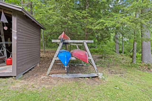66 Myron Hall Rd, Raymond, ME 04071 - view of yard featuring an outbuilding and a forest view