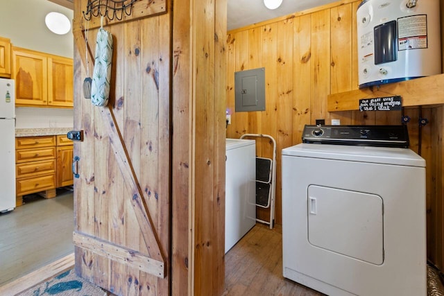 66 Myron Hall Rd, Raymond, ME 04071 - washroom with wood finished floors, electric panel, electric water heater, separate washer and dryer, and wooden walls
