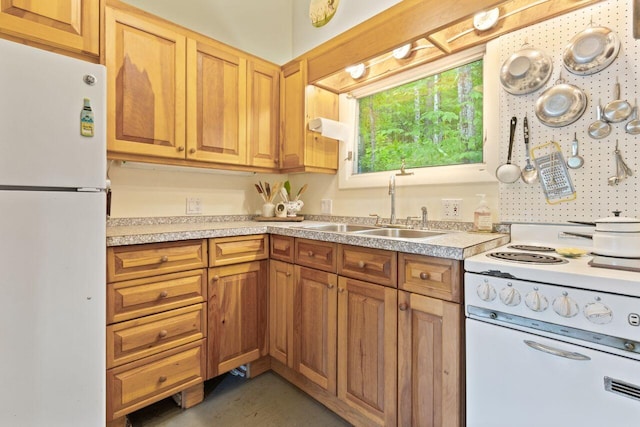 66 Myron Hall Rd, Raymond, ME 04071 - kitchen with white appliances, a sink, light countertops, and concrete floors