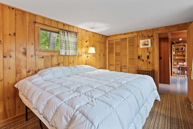 66 Myron Hall Rd, Raymond, ME 04071 - bedroom with wood walls and a closet