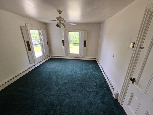 25 Jarvis Gore Dr, Eddington, ME 04428 - empty room with dark colored carpet, baseboard heating, plenty of natural light, and ceiling fan