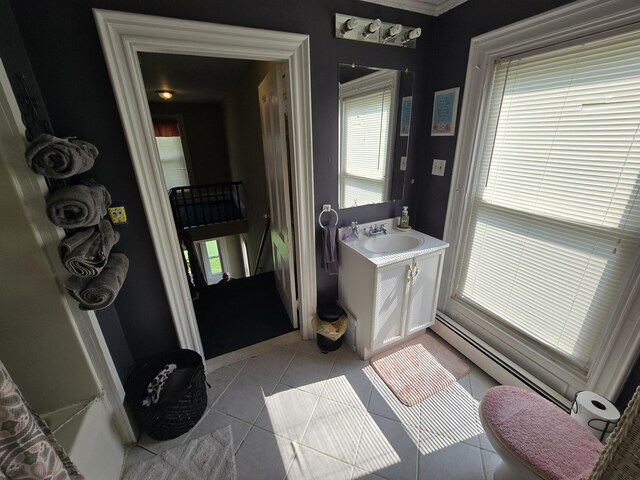 25 Jarvis Gore Dr, Eddington, ME 04428 - bathroom featuring tile patterned floors, vanity, and a baseboard radiator