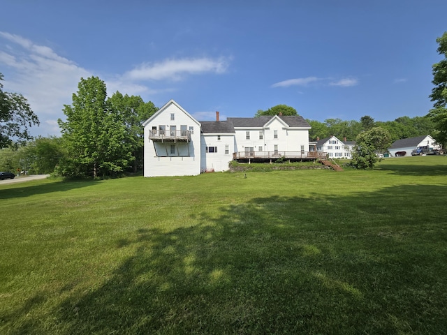 25 Jarvis Gore Dr, Eddington, ME 04428 - back of house with a wooden deck, a yard, and stairway