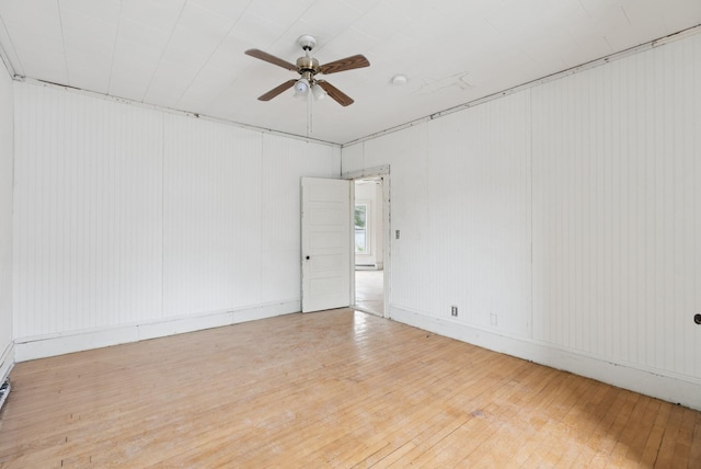 9 Maple St, Jay, ME 04239 - empty room with wood-type flooring and ceiling fan