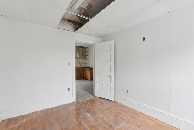 9 Maple St, Jay, ME 04239 - unfurnished room featuring wood finished floors and baseboards