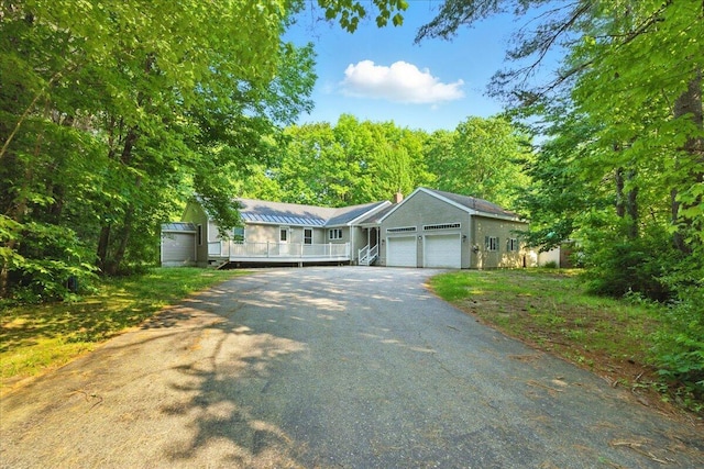 14 Goshen Ln, New Gloucester, ME 04260 - ranch-style house featuring driveway, an attached garage, and a chimney