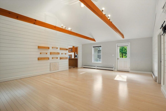 14 Goshen Ln, New Gloucester, ME 04260 - unfurnished living room featuring a baseboard radiator, light wood-type flooring, beam ceiling, high vaulted ceiling, and baseboards