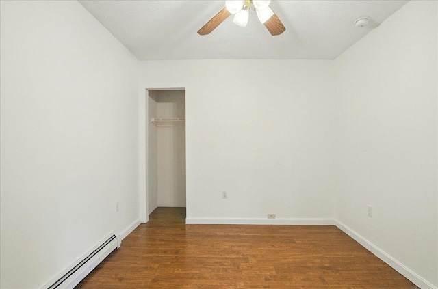 14 Goshen Ln, New Gloucester, ME 04260 - unfurnished bedroom with wood finished floors, a baseboard heating unit, a closet, baseboards, and ceiling fan