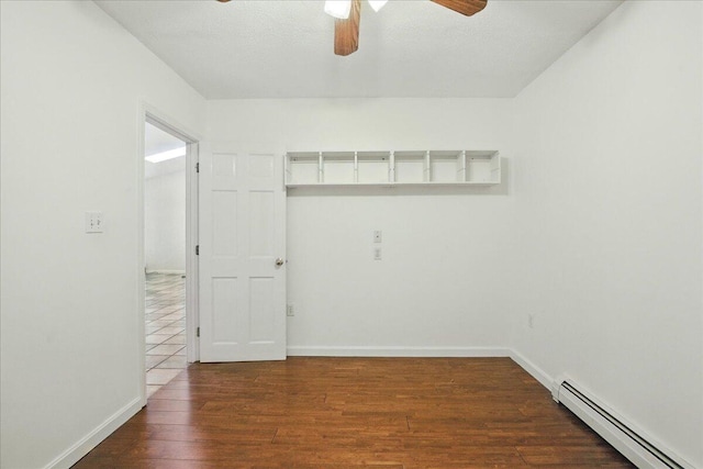 14 Goshen Ln, New Gloucester, ME 04260 - unfurnished room featuring a baseboard heating unit, a ceiling fan, wood finished floors, and baseboards
