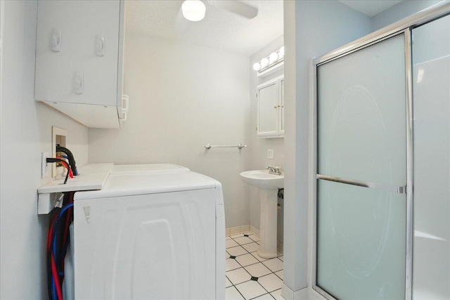 14 Goshen Ln, New Gloucester, ME 04260 - full bathroom with a shower stall, baseboards, washer and clothes dryer, and a ceiling fan