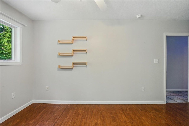 14 Goshen Ln, New Gloucester, ME 04260 - unfurnished room with wood finished floors, baseboards, and a ceiling fan