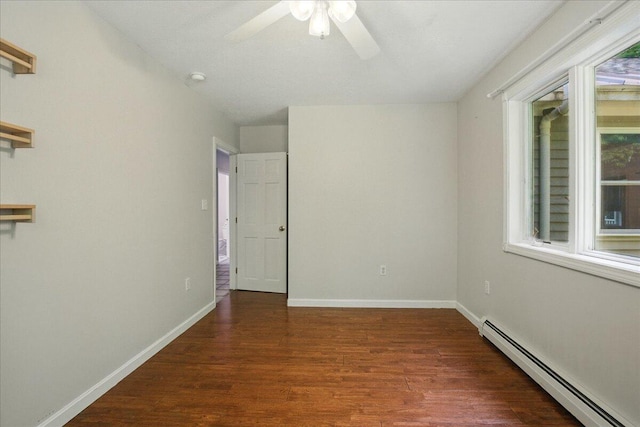 14 Goshen Ln, New Gloucester, ME 04260 - empty room with a baseboard radiator, ceiling fan, wood finished floors, and plenty of natural light