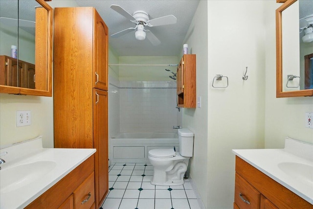 14 Goshen Ln, New Gloucester, ME 04260 - bathroom with ceiling fan, tile patterned flooring, two vanities, toilet, and shower / washtub combination