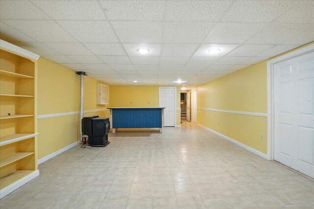 14 Goshen Ln, New Gloucester, ME 04260 - finished below grade area with a wood stove, baseboards, and built in shelves