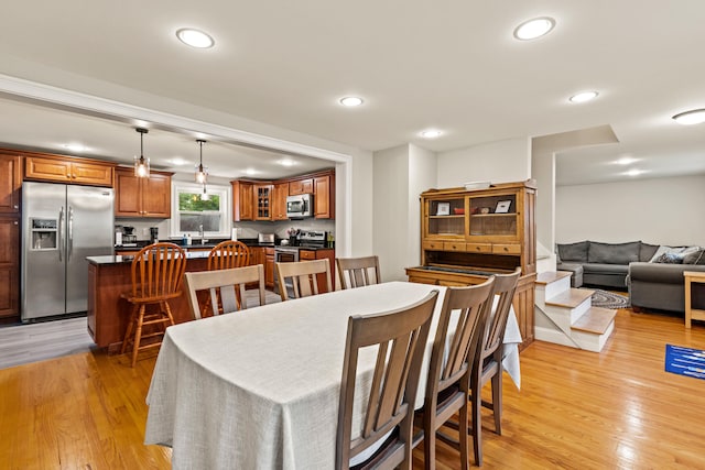 534 Summit St, Portland, ME 04103 - dining area with light wood-style flooring and recessed lighting