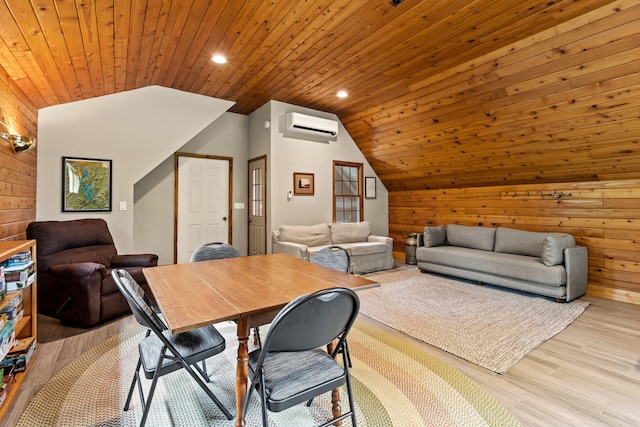 534 Summit St, Portland, ME 04103 - dining room with a wall mounted AC, lofted ceiling, wooden walls, wooden ceiling, and light wood-style flooring