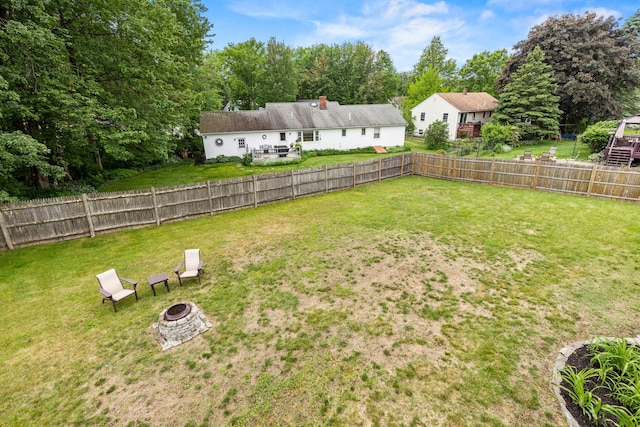 534 Summit St, Portland, ME 04103 - fenced backyard with a fire pit