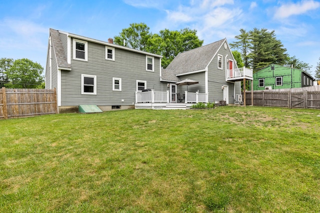 534 Summit St, Portland, ME 04103 - back of house with a deck, a fenced backyard, and a chimney