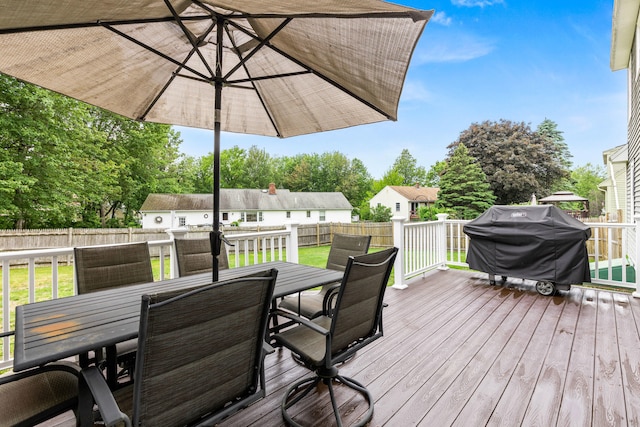 534 Summit St, Portland, ME 04103 - wooden deck with outdoor dining area, a fenced backyard, and grilling area