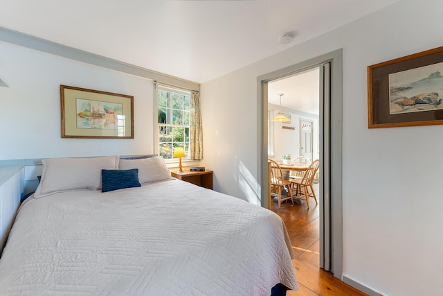 36 Hodgdon Rd, Westport Island, ME 04578 - bedroom with light wood-style floors and baseboards