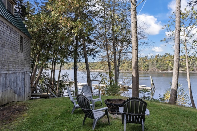 36 Hodgdon Rd, Westport Island, ME 04578 - view of green lawn with a water view and a fire pit