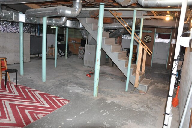5 Charles St, Orono, ME 04473 - unfinished below grade area featuring heating fuel and stairs