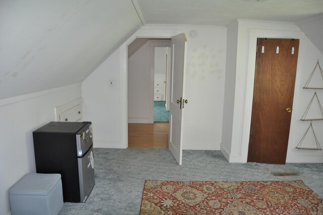 5 Charles St, Orono, ME 04473 - additional living space featuring carpet flooring and lofted ceiling