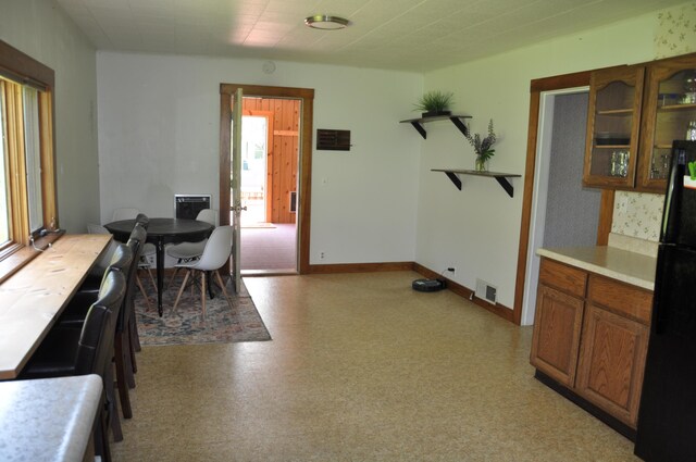 5 Charles St, Orono, ME 04473 - dining room featuring light flooring, plenty of natural light, and baseboards