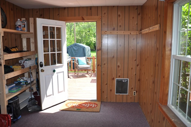 5 Charles St, Orono, ME 04473 - entryway featuring wooden walls, carpet flooring, and heating unit