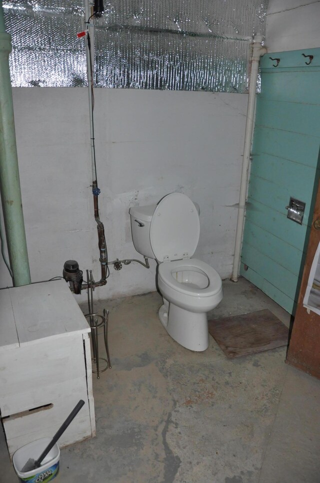 5 Charles St, Orono, ME 04473 - bathroom with concrete flooring and toilet