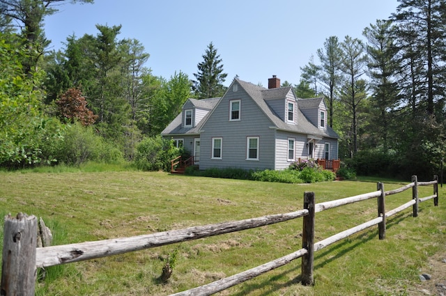 5 Charles St, Orono, ME 04473 - view of home's exterior featuring a chimney