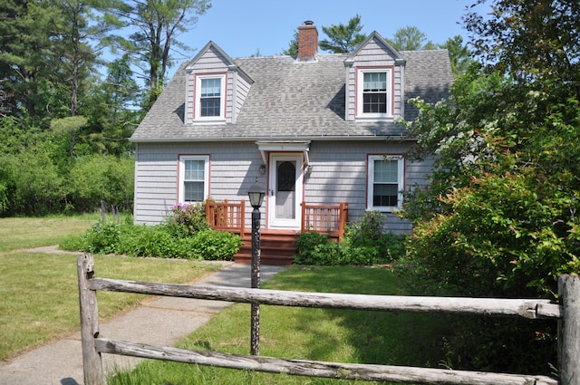 5 Charles St, Orono, ME 04473 - cape cod house with a shingled roof, a chimney, and a front yard