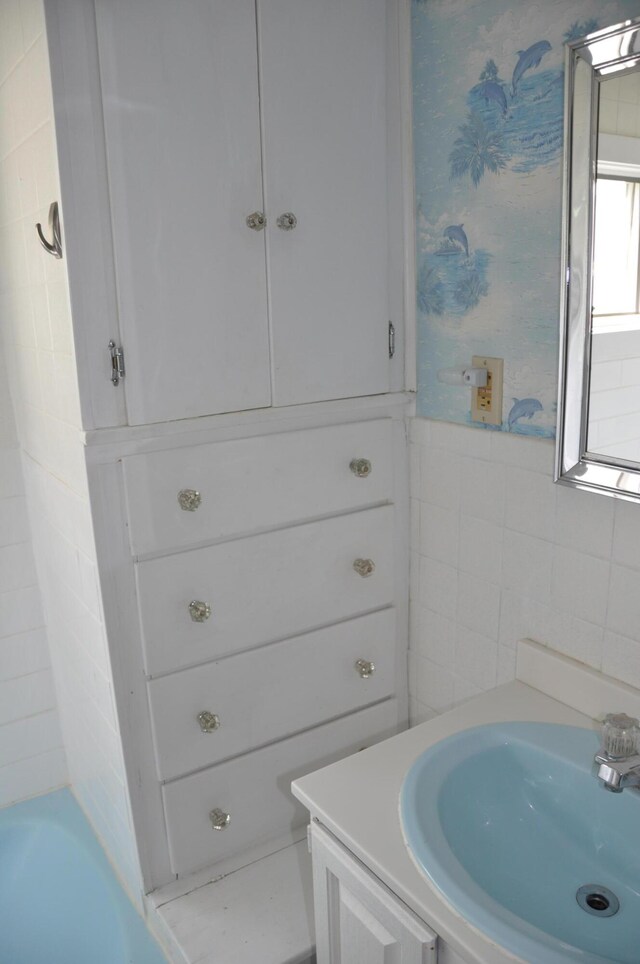 5 Charles St, Orono, ME 04473 - full bathroom featuring vanity and tile walls