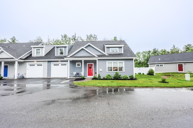 3 Jennifer Ln Unit 1, Wells, ME 04090 - view of front of property with a garage, asphalt driveway, and a shingled roof