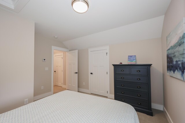 3 Jennifer Ln Unit 1, Wells, ME 04090 - bedroom featuring light colored carpet and lofted ceiling