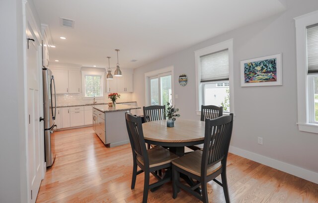 3 Jennifer Ln Unit 1, Wells, ME 04090 - dining space with light wood-style flooring and recessed lighting