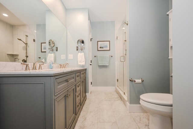 3 Jennifer Ln Unit 1, Wells, ME 04090 - bathroom featuring a shower stall, double vanity, marble look tile flooring, and recessed lighting