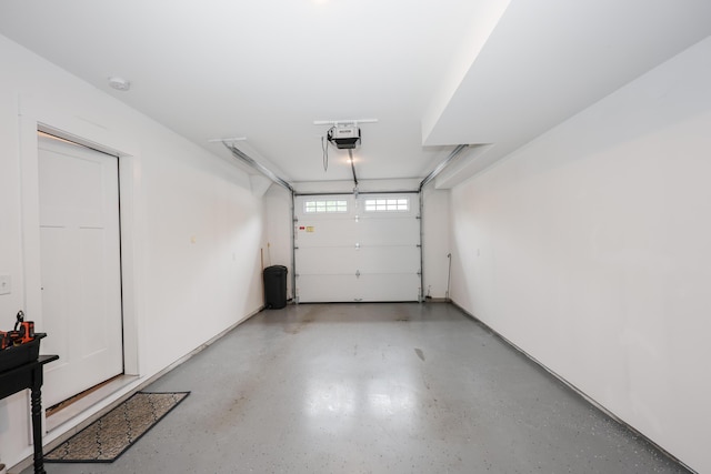 3 Jennifer Ln Unit 1, Wells, ME 04090 - garage featuring a garage door opener