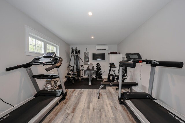 3 Jennifer Ln Unit 1, Wells, ME 04090 - workout room with a wall unit AC, wood finished floors, and recessed lighting