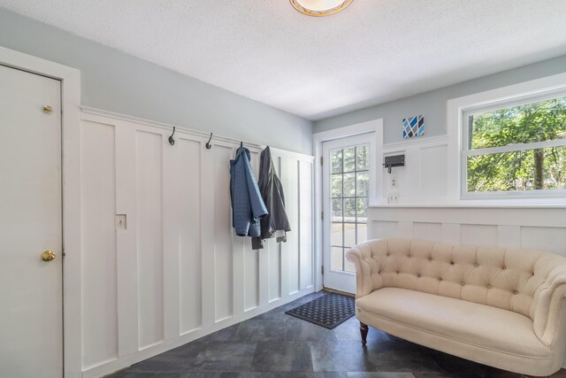 18 Brian Dr, Brewer, ME 04412 - foyer featuring a decorative wall and a textured ceiling