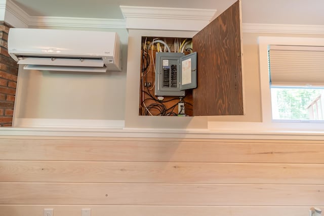 18 Brian Dr, Brewer, ME 04412 - detailed view of electric panel, an AC wall unit, and ornamental molding