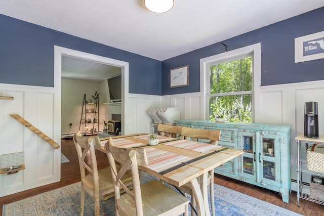 18 Brian Dr, Brewer, ME 04412 - dining area with a wainscoted wall, a decorative wall, and wood finished floors
