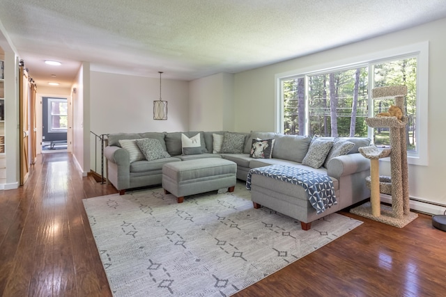 18 Brian Dr, Brewer, ME 04412 - living room featuring wood-type flooring and a textured ceiling