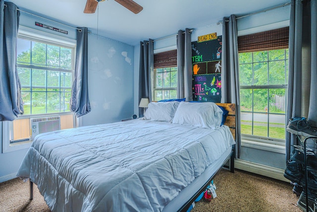 10 Empire Way, Portland, ME 04103 - carpeted bedroom featuring multiple windows, a ceiling fan, and cooling unit