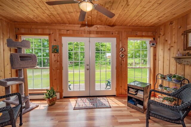 52 Judkins Rd, Harmony, ME 04942 - doorway featuring french doors, wooden walls, wooden ceiling, ceiling fan, and wood finished floors