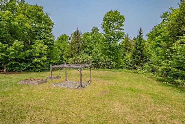 52 Judkins Rd, Harmony, ME 04942 - view of grassy yard featuring a pergola