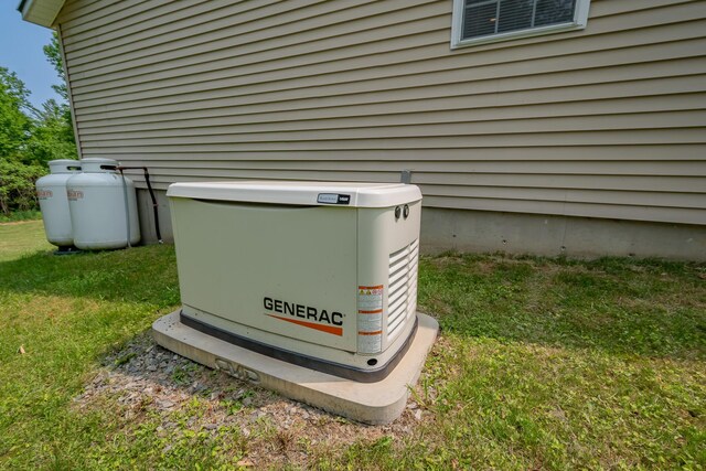 52 Judkins Rd, Harmony, ME 04942 - exterior view of a power unit and heating fuel tank