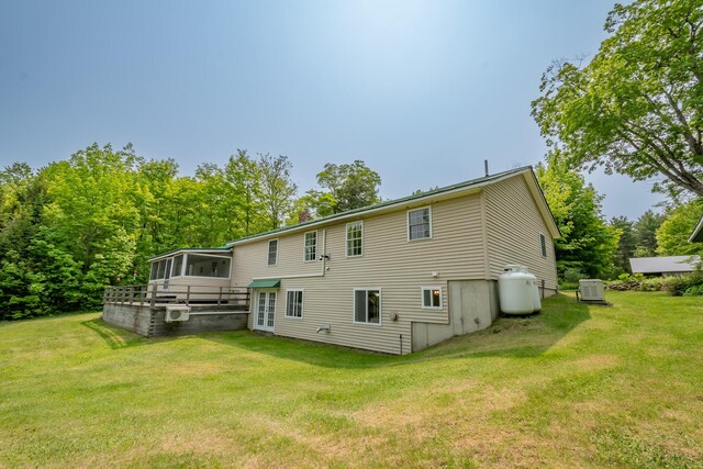 52 Judkins Rd, Harmony, ME 04942 - back of house with a sunroom and a yard