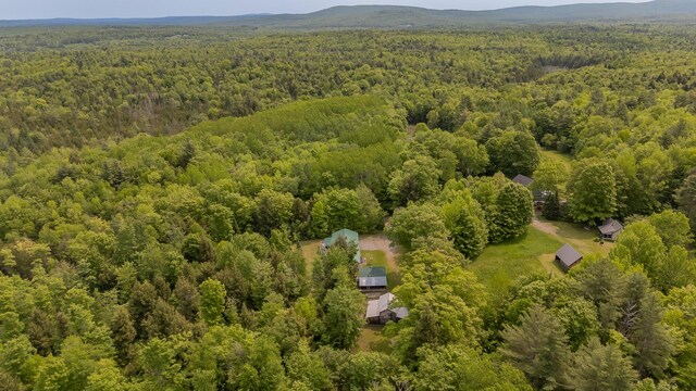 52 Judkins Rd, Harmony, ME 04942 - drone / aerial view of a heavily wooded area and a mountainous background